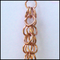 Cascade Earrings (Copper) - 2 inches. Copper rings with base metal earring wires.